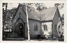 Small chapel with archway entrance, old photo
