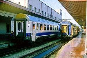 A Paris–Algeciras through coach (at right) being shunted at Irun railway station, Spain, 1993.