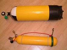  Two steel cylinders are shown: The larger is about twice the diameter of the smaller, and about 20% longer.