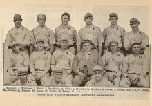 Members of the 1916 Nashville Volunteers sitting on bleachers.