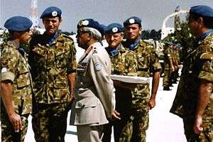 Photograph of General Prem Chand presenting medals to the members of the first Australian contingent