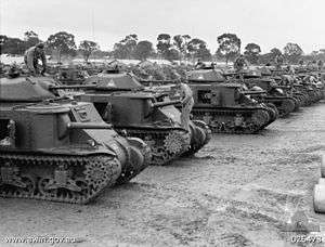 A line up of dozens, if not hundreds of tanks