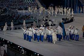 Estonian delegation in 2010 Winter Olympics, opening ceremony white jackets and blue trousers