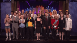 The cast and special guests of the 30 Rock episode "Live Show" stand on the set of The Girlie Show with Tracy Jordan. From left to right: Katrina Bowden, Donald Glover, Jimmy Fallon, Grizz Chapman, Sue Galloway, Amy Poehler (front row), Daniel Genalo, Keith Powell, Tracy Morgan, Jon Lutz, Jack McBrayer, Tina Fey, Paul McCartney, Jon Hamm, Alec Baldwin, Scott Adsit, Kevin Brown, Will Forte (second row), Jane Krakowski, Judah Friedlander, Kristen Schaal, Chris Parnell (first row), and Fred Armisen