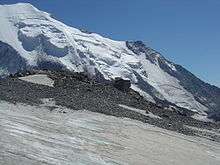 Mountain hut beside glacier