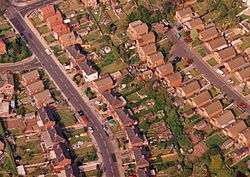Aerial photo of Surgeys Lane. To the right is Catriona Crescent, far left the junction with Jenned Road and at the top the junction with Homefield Avenue.