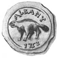 A black and white image shows a wax seal consisting of a circle, inside which is a beaver at center, topped by the letters ALBANY, atop the year 1752.