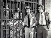 Townspeople locked in Mayberry jail.