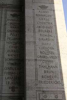 Photo shows Columns 19 and 20 under the Arc de Triomphe in Paris. There is a list of French-sounding names.