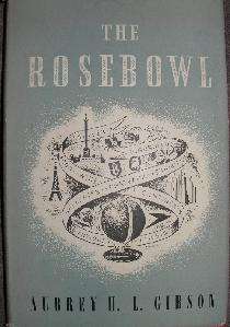 grey front cover of a book, including the book title text "The Rosebowl" and the author name "Aubrey H. L. Gibson". It is illustrated in the centre with a globe, entwined with a ribbon that lists topics such as "silver", "flights" and "chateaux", together with small sketches of objects, including the Eiffel Tower and silver hallmarks.
