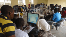 The Incubators Youth Outreach Network-Nigeria working with computers at a training programming center