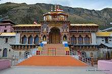image showing Badrinath temple with mountain in the background
