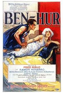 The theatrical poster for Ben-Hur (1925) depicting a man behaving in a sexually aggressive manner towards a woman cowering from him.