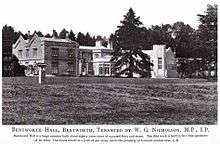 The south side of Bentworth Hall as it appeared in 1905. The black and white photo shows a large fir tree, the gardens and the manor itself