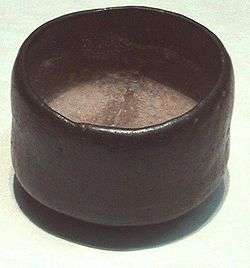 Photo of a tea bowl, dark-coloured, humble, and asymmetric