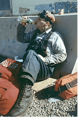 Executive 'Pronto' (Byron Mulver) taking a break during freight hoboing adventure ending 9/11/2001