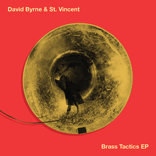 A piece of recording equipment hanging out of a brass horn on an orange background with "David Byrne & St. Vincent" and "Brass Tactics" written in yellow
