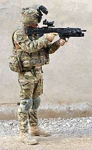 A British Army infantryman showing full combat dress and standard personal kit (front)