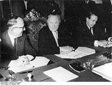 Walter Hallstein, Konrad Adenauer and Herbert Blankenhorn sitting at a conference table