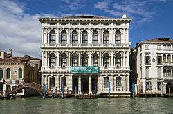 The White marble façade of Ca' Rezzonico on the Grand Canal