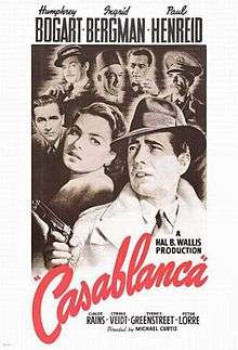 Black-and-white film screenshot with the title of the film in fancy font. Below it is the text "A Warner Bros. – First National Picture". In the background is a crowded nightclub filled with many people.