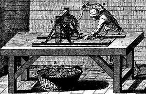 An illustration of a man operating a crank-powered machine