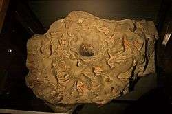 A ceiling boss from Merton Priory, discovered in excavations of Nonsuch Palace, on display in the Museum of London.