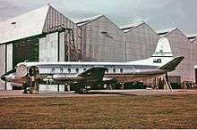 A Vickers Viscount aircraft on a runway, photographed from the port side