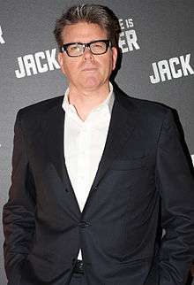 Christopher McQuarrie on the red carpet at a film festival.