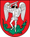 A coat of arms depicting an angel in full body armour and wings outspread while standing on a green dragon with a twisted tail