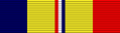 A multicolored military ribbon. From left to right the color pattern is; very thick blue stripe, very thick yellow stripe, thin red stripe, thick white stripe, thin blue stripe, very thick yellow stripe, very thick red stripe