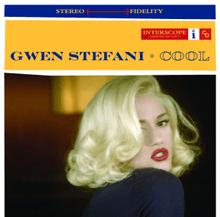 A blond woman is looking back over her right shoulder. She is wearing a dark blue blouse and red lipstick, and she is in a room. Above her image are two stripes. The upper is blue and the words "Stereo" and "Fidelity" are written in light yellow, and between them there is a long red arrow (←→). The second strip is yellow; on it the words "Gwen Stefani · Cool" are written in navy blue capital letters.