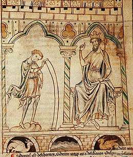 A yellowed manuscript illustrated with two men each placed under an arch supported by columns. The one on the left is wearing a short tunic and cloak and unrolls a long scroll to show to the other figure. The figure on the right is dressed in long robes, wears a crown and is seated and carrying a sceptre.