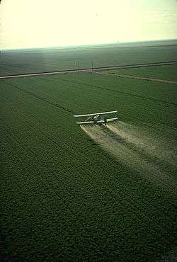 Cropduster spraying pesticides.