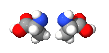 Animation of two mirror image molecules rotating around a central axis.