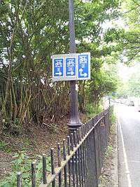Direction signs for multiple London Cycle Network routes.
