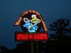 Colorful, busy lit neon sign with an anthropomorphic dog waiter and the legend "Dog n Suds"