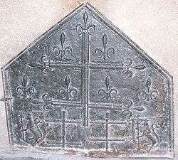 Five-sided piece of metal, decorated with crosses and fleurs-de-lis.