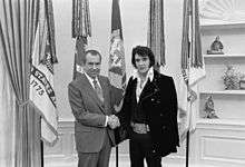 Richard Nixon and Elvis Presley shaking hands