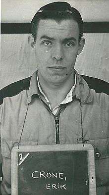 Portrait in black and white of Erik Crone in custody