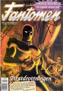Comic-book cover, with the Phantom holding a sword
