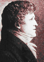 Black and white print of a man in a dark coat with a white shirt. He has a strong chin and wavy hair and looks to the right.