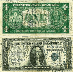 An American banknote (one dollar bill) that has several signatures on it.