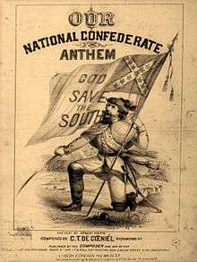Soldier down on one knee, holding  the Confederate flag in one hand and a sword in the other