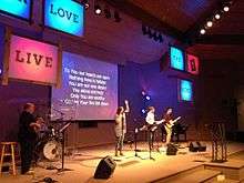 A contemporary worship team leads the congregation in praise and worship