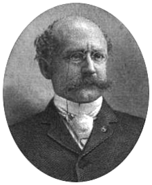Head of a balding white man with a bushy mustache wearing pince-nez glasses and a dark suit over a light-colored shirt and tie. The portrait is framed by laurel wreaths on the bottom and the words "HON. HENRY H. BINGHAM" are below.