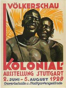 A poster depicting two black African faces.