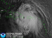 Hurricane moving through the Caribbean. Its well-defined center is situated near the coast of the Dominican Republic.