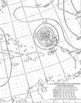 A drawn weather map of Hurricane Dog. The storm is depicted to be north of Puerto Rico. The eastern tip of North Carolina is seen in the top-left portion of the map.