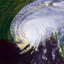 Hurricane making landfall on the United States. Part of the storm is still over open waters